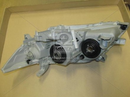 20C987052B TYC Фара передня в зборі